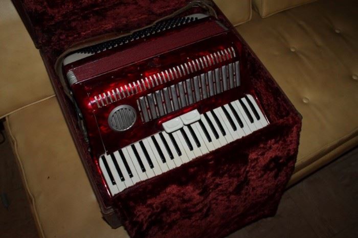 Vintage accordion w/ case