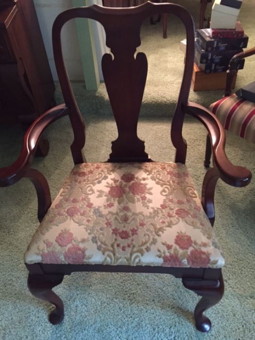 Captain's dining chair.  There are 5 side chairs.  Sold as a set