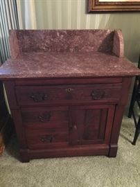 Lovely Eastlake washstand with raspberry marble top and splash back.