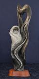This sculpture is made of soapstone by 'Elk Woman" Kathy Whittman.