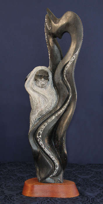 This sculpture is made of soapstone by 'Elk Woman" Kathy Whittman.