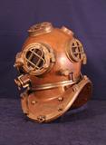 This unbelievable Morse Diving Equipment, Mark 5, U.S. Navy diver's helmet was made in 1941 is made of copper. It is in remarkable condition.