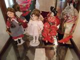 This is a dolls collectors dream. These are some of the porcelain and Japanese dolls we have.