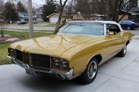 Your dream car from way back when. 1971 Olds Cutlass Supreme Covertible in gold. Minty Condition!!