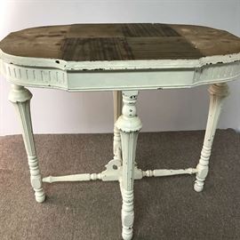 Shabby Chic oval table with wood exposed top. Measures 30" tall x 31" wide
