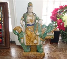 PAIR OF LARGE SANCAI GLAZE STATUES OF SEATED KWAN ON FOO DOG