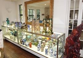 DISPLAY CASE WITH SOME OF THE ASIAN COLLECTION BEING OFFERED AT THE SALE