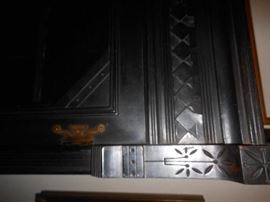 Close up of hutch carving & hardware