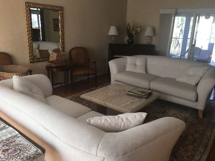 Pair white sofas, coffee table