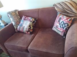 Warm Upholstered Love Seat with 4 matching pillows