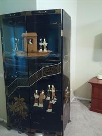 Chinese four paneled free-standing lacquered wood screen