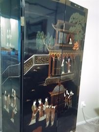 Chinese four paneled free-standing lacquered wood screen