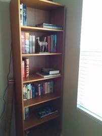 Nice wood book shelf with variety of books
