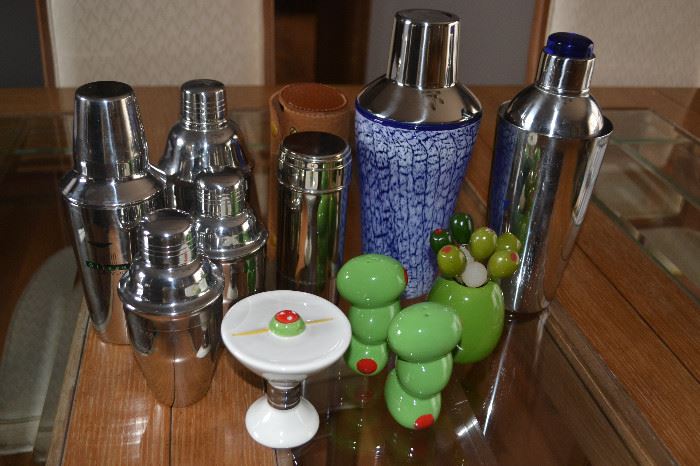 Cocktail shakers, barware, and hundreds of martini glasses.