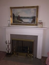 beautiful framed art and fireplace tools