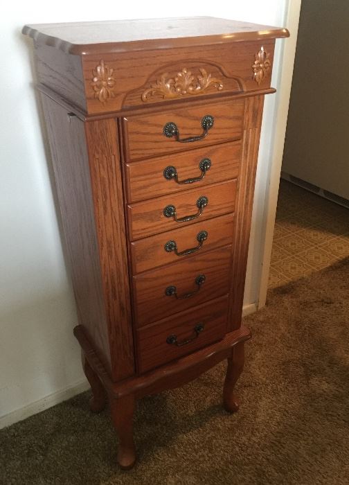 Large stand alone jewelry case with drawers and fold out sides