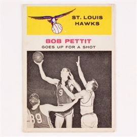 1961 Fleer Bob Pettit IA #59 Basketball Card: A 1961 Fleer Bob Pettit IA #59 basketball card. The card features a portrait of Bob taking a jump shot while fending off another player. He played eleven seasons with the St.Louis Hawks from 1954 to 1965 and is most known for being the first person to receive the NBA’s most valuable player award and was inducted into the basketball hall of fame in 1970.
