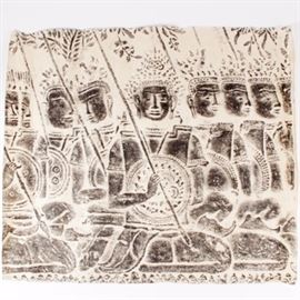Cambodian Rubbing from Angkor_Wat: A Cambodian rubbing from Angkor_Wat. The rubbing features a black and white copy from one of the architectural pieces of the ancient tomb. This piece shows a series of soldiers dressed in armor and traditional headdress’ with a spear in one hand and shield across their chests. The piece is unmarked.