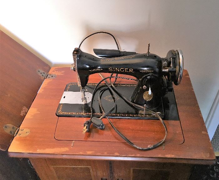 This sewing machine is from the executress' great great uncle - Elias Howe - inventor of the 1st American sewing machine in 1864.  This was originally a portable sewing machine but was added to this sewing cabinet.  Sewing machine in cabinet also includes the bench.  Don't miss a part of this historical sewing machine!!  http://www.iwest.k12.il.us/schools/thawville/projects/1800/index.html