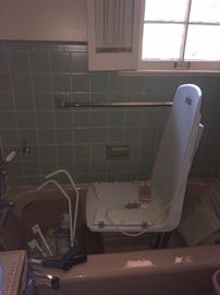 Mechanized shower/tub chair