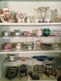 Demitasse cups & saucers and other knick knacks.