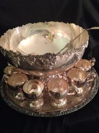 Exceptional silver plate punch bowl, ladle, tray, and matching cups