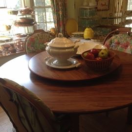 Round Lazy Susan breakfast table with 6 matching chairs; white stoneware selections 