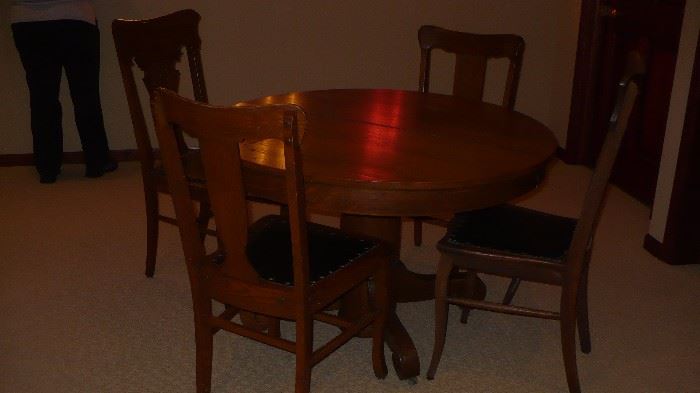 antique round oak table and 4 chairs