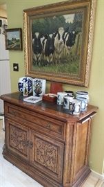 Top quality server with pull out boards for extra space.  Great small size.  large oil painting of cow in the pasture by Knud Edsberg