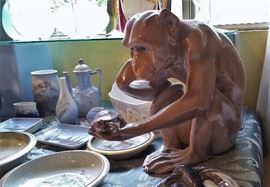 B&G - large, almost lifesize monkey contemplating turtle figurine.  We have named the monkey Yorick and are worried about the turtle.