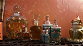 oversize perfume bottles.  and frog. he sees all.