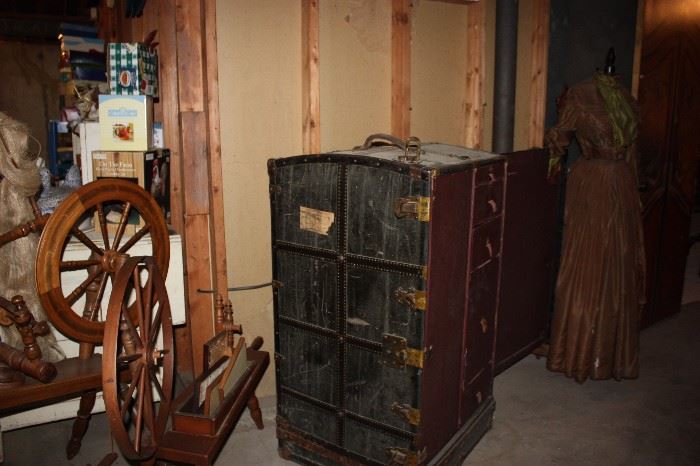 Antique steamer trunk, spinning wheel, dress and form