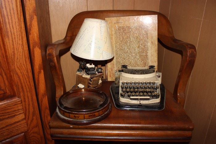 Antique typewriter, ashtrays, office desk chair