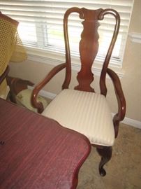 One of 8 dining chairs