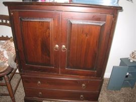 Top part of this piece swivels.  Possibly a TV stand