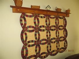 Wall hanger with handmade quilt