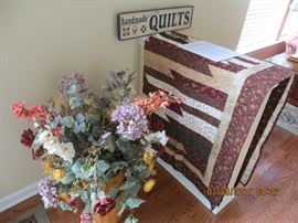 A number of Floral plants in containers