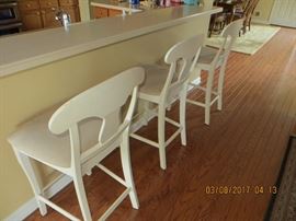 Three painted bar stools