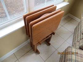 SOLD ON LINE PRIOR to the ONE DAY SALE THIS COMING WEEKEND  :Four heavy wooding TV tables stacked