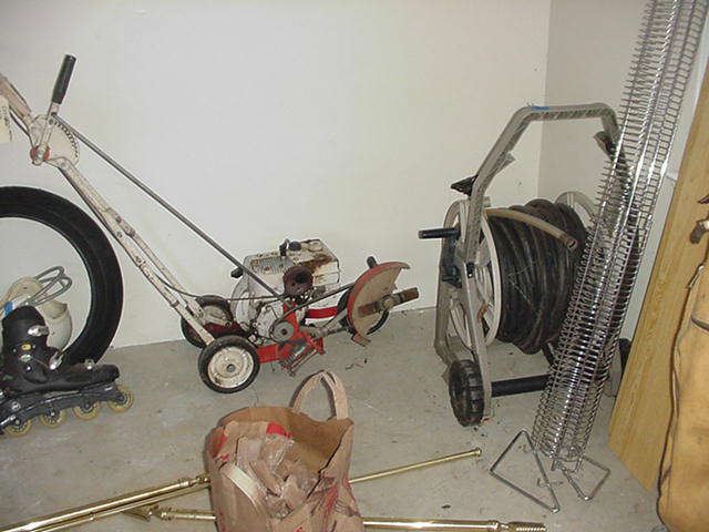 Edger, Hose and carrier, CD stand, curtain rods, skates, helmet, and more
