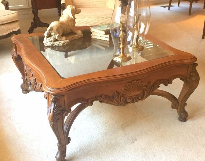 Glass top coffee table from Hickory White. Beautiful carving on frame.