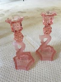 Pink depression glass dolphin candlesticks
