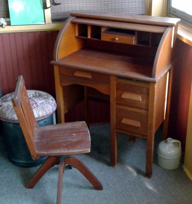 Real wood antique/vintage child’s roll top desk and swivel chair - pull out tray (above 2 side drawers) is missing: $180
