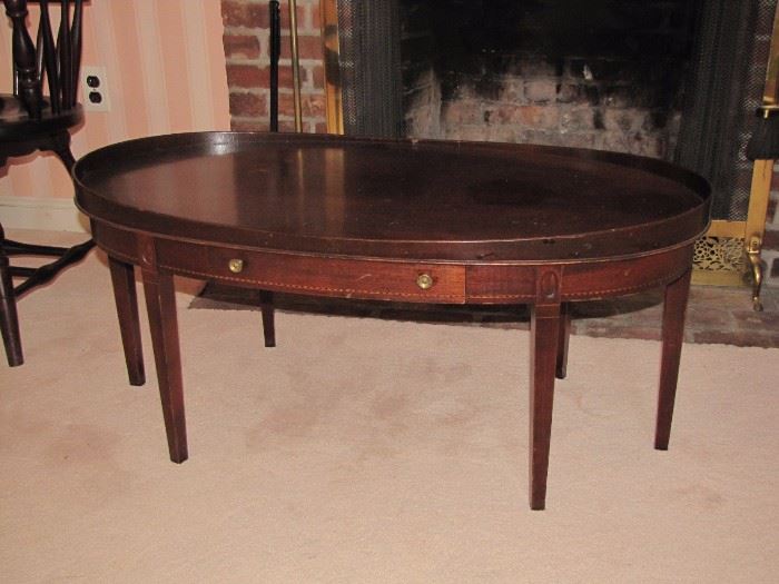mahogany oval coffee table with inlay and drawer