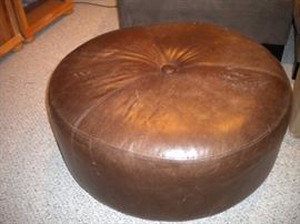 Large round leather ottoman