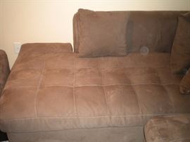 Quality L shaped sectional with matching ottoman. Also Leather round ottoman.