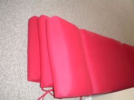 Patio set with 6 chairs, red cushions, seperate umbrella and stand, 4 chaise outdoor lounge chairs with red cushions.