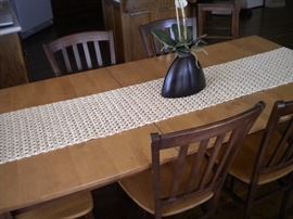 Sharp kitchen table and 6 chairs. Solid wood two tone with one leaf.