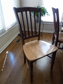 Sharp kitchen table and 6 chairs. Solid wood two tone with one leaf.