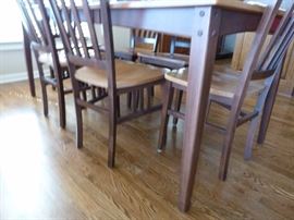 Sharp kitchen table and 6 chairs. Solid wood two tone with one leaf.
